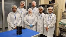 Samiha Lubaba (VE9LMB), Noah Lydon (VE9NL), Joudi Al-Lathqani, Brent Petersen (VE9EX), Dhyan Baruah and Quynh Nguyen (VE9QN), at the Canadian Space Agency with VIOLET, November 27, 2023. Image credit: Canadian Space Agency